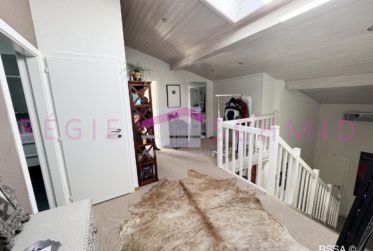 Villa jumelle de 7 pièces avec vue lac et Alpes à Borex